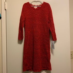 Little girl’s red sweater dress